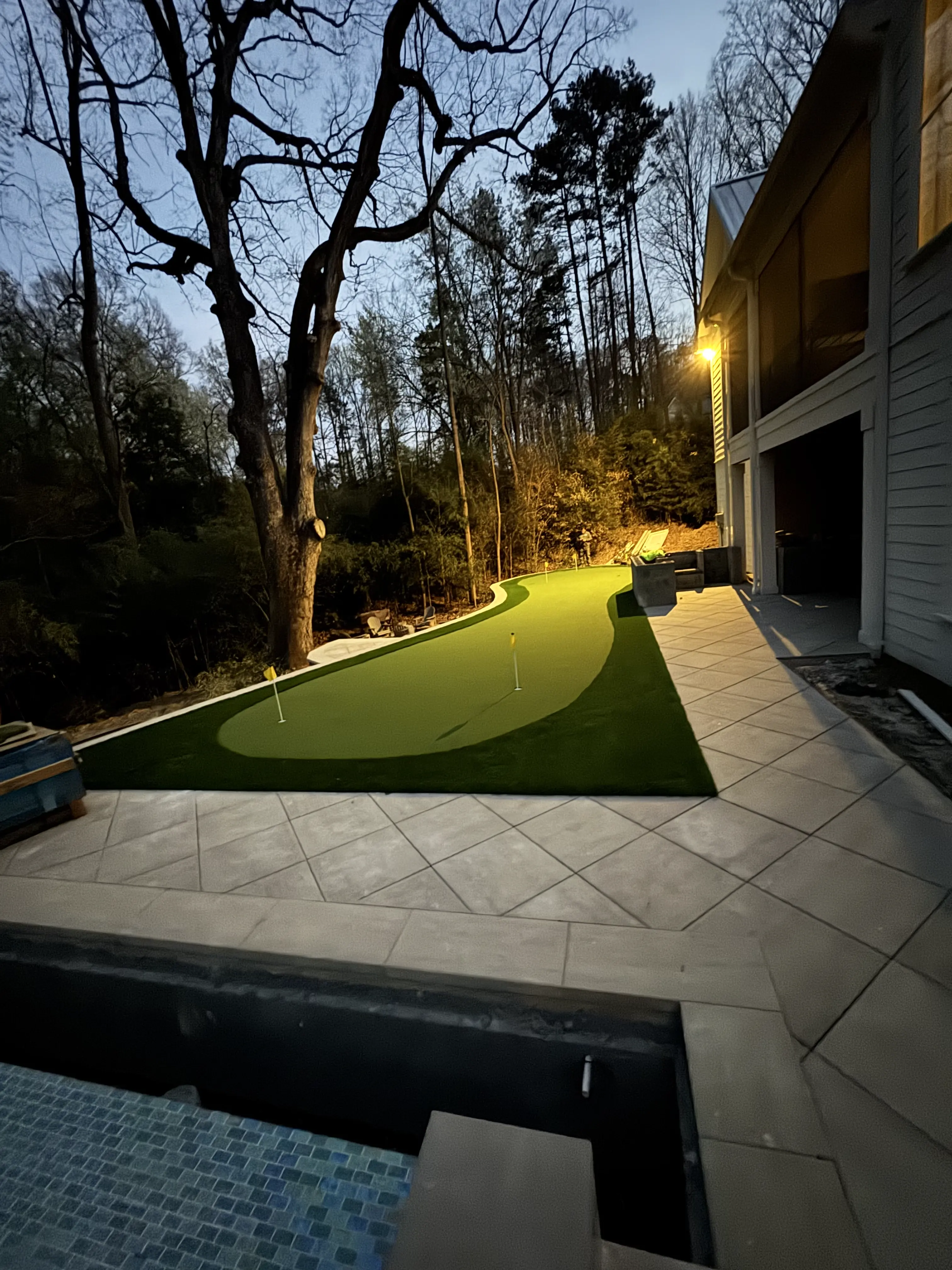 Putting Green — Pool-Side Patio, Dusk Install