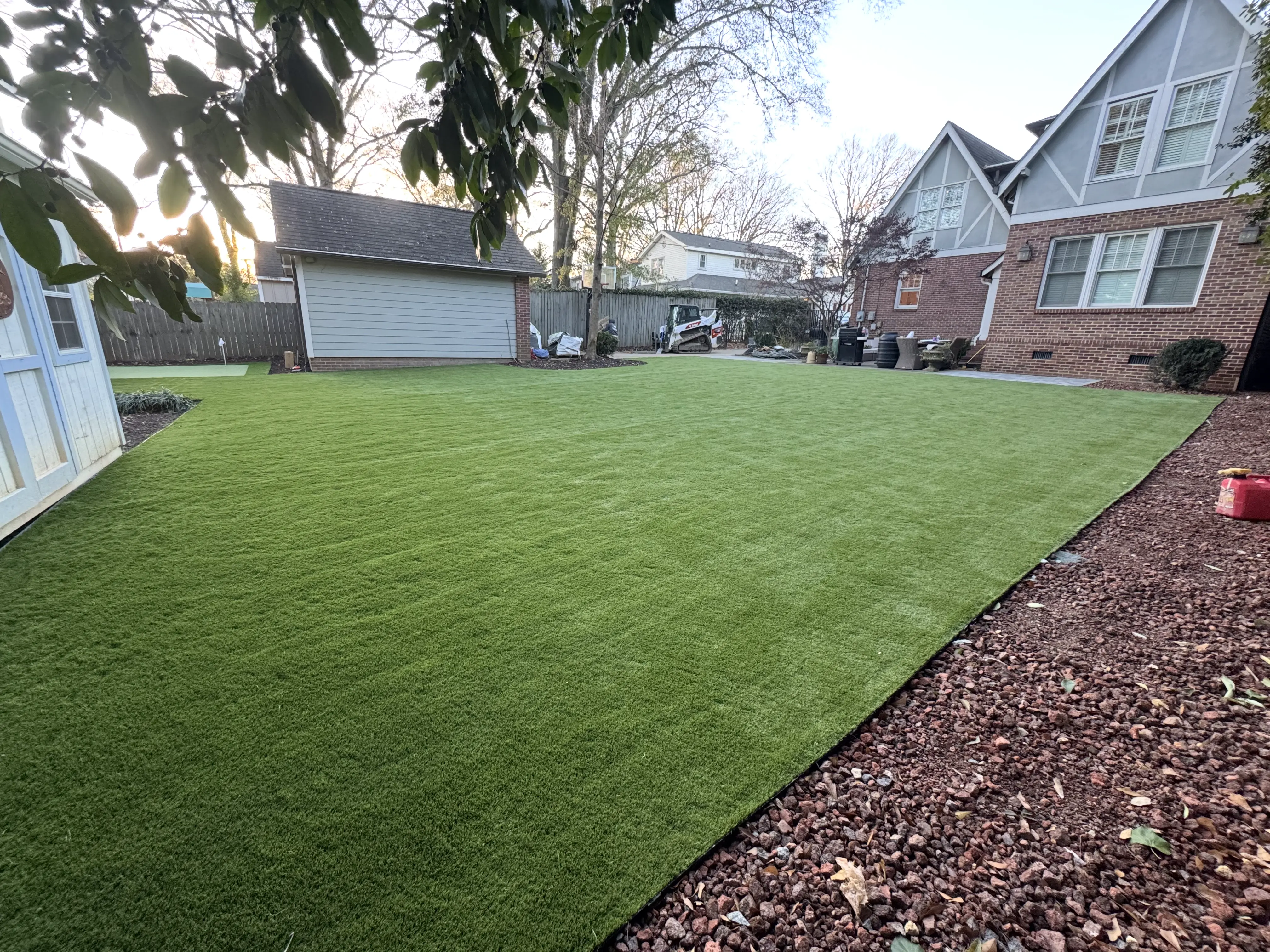 Wide Residential Backyard at Dusk